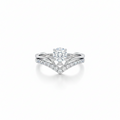 Elegant 925 silver bridal ring set featuring a round-cut solitaire stone with pavé accent band on a white background.