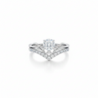 Elegant 925 silver bridal ring set featuring a round-cut solitaire stone with pavé accent band on a white background.