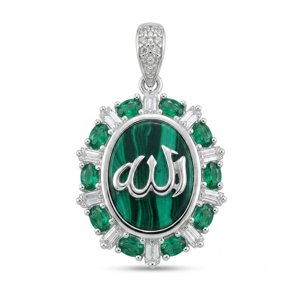 A silver pendant featuring a central oval green malachite inlay with the silver Arabic calligraphy of 'Allah' in the center, surrounded by a halo of round and baguette-cut green emeralds and clear stones, on a white background.