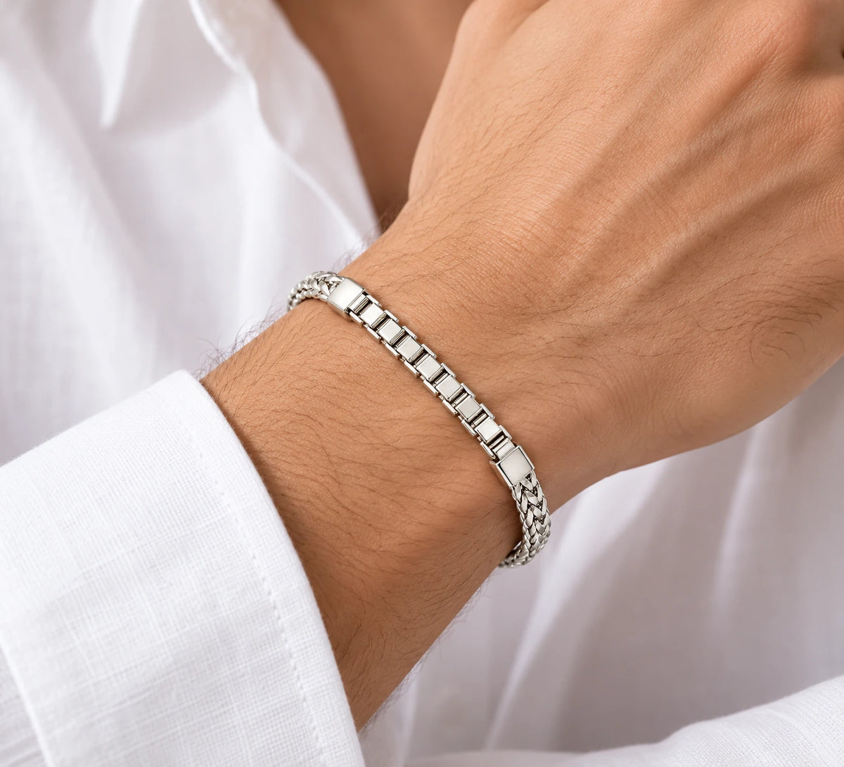 Men's 925 sterling silver spiga and box link bracelet worn on man's wrist with white shirt, lifestyle shot, Fine Silver KSA