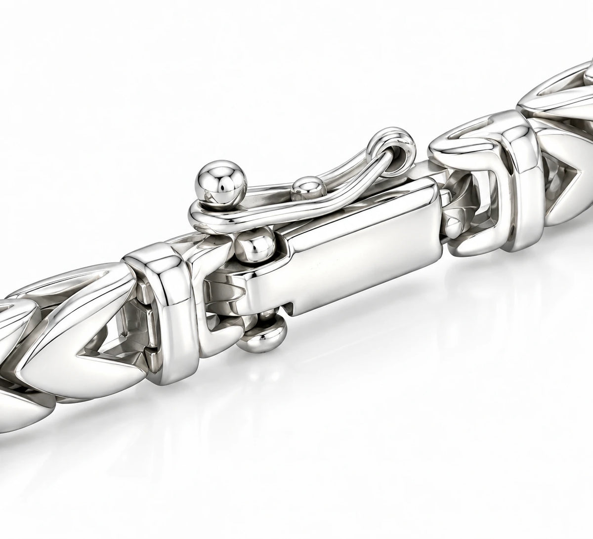 Close-up of micro box clasp with ball-tip safety lever on men's 925 sterling silver chevron Byzantine bracelet, Fine Silver KSA