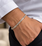 Men's 925 Italian sterling silver chevron Byzantine bracelet worn on man's wrist with white dress shirt, lifestyle shot, Fine Silver KSA