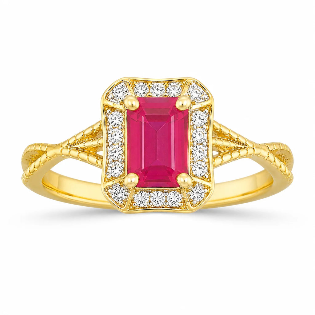 Gold ring with a pink gemstone and diamond accents on a white background