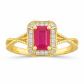 Gold ring with a pink gemstone and diamond accents on a white background