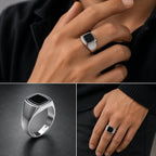 Silver ring with a black center on a hand, shown from different angles.