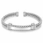Men's silver open cable cuff bracelet with twisted detailing, polished centre bar and ribbed accents on white.
