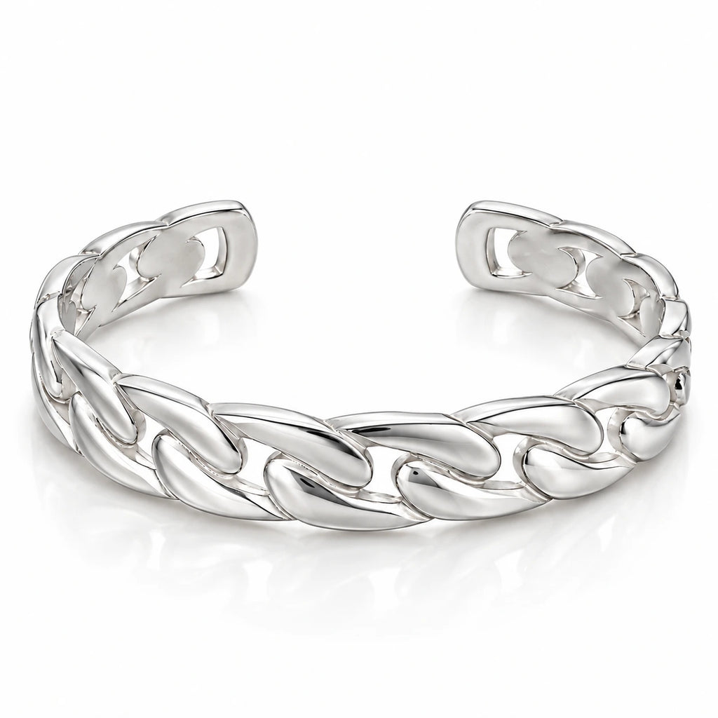 Men's polished silver open cuff bracelet with broad sculptural chain-link motifs and rounded ends on white.