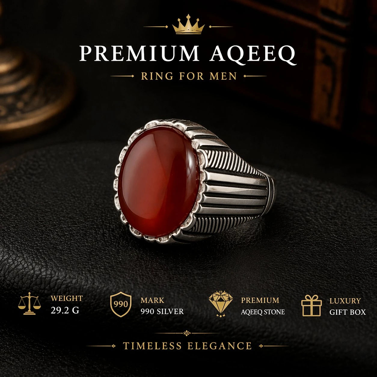 Silver ring with a red stone on a dark background, featuring Premium Aqeeq branding.