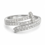 Silver ring with diamond accents on a white background