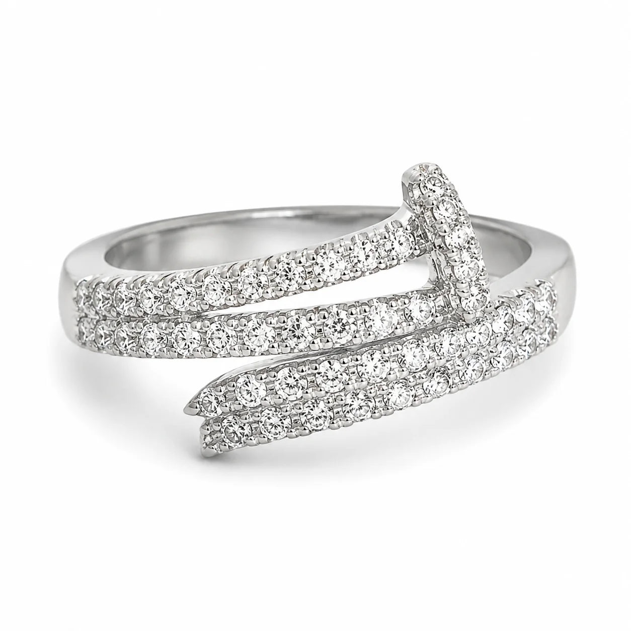 Silver ring with diamond accents on a white background