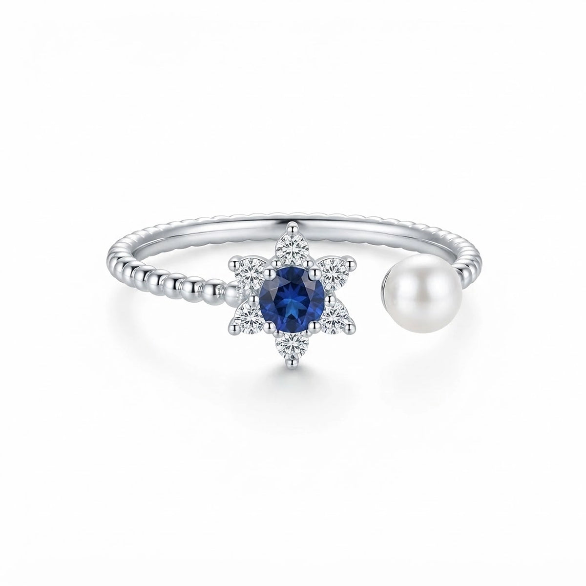 Women's 925 Italian sterling silver open adjustable ring with blue sapphire CZ star halo and freshwater pearl terminal, white background, Fine Silver KSA